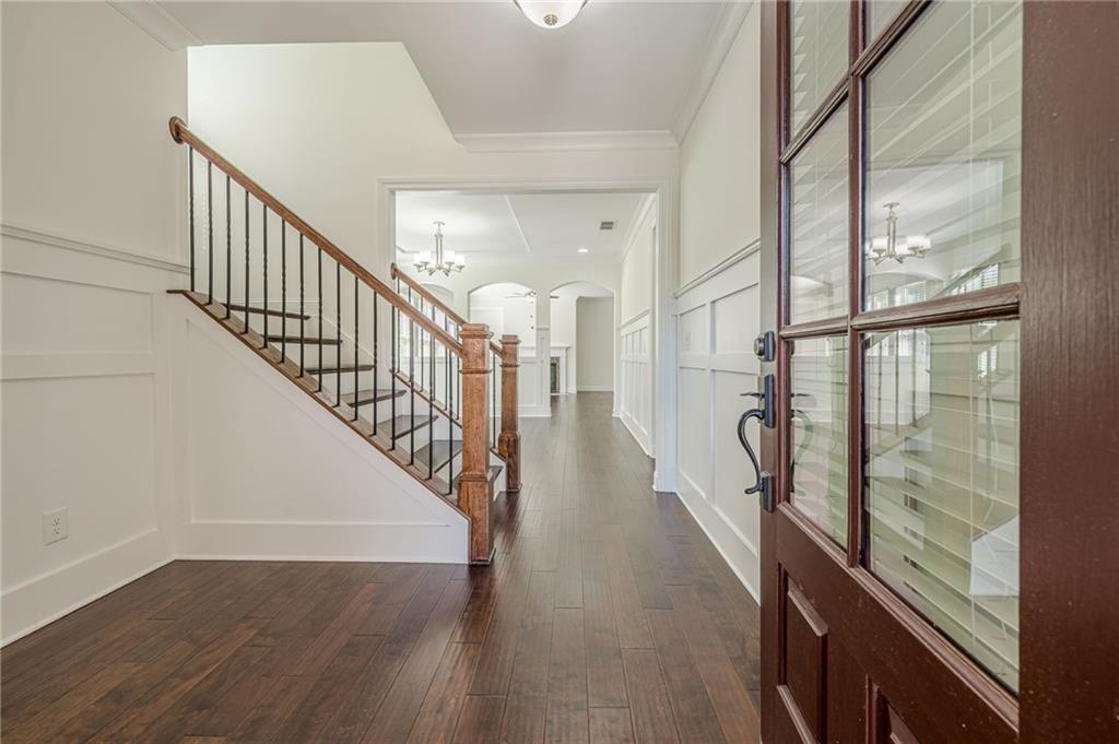 1040 Peyton View Court Alpharetta, GA 30004 - Photo 8 of 53 a view of entryway and hall with wooden floor