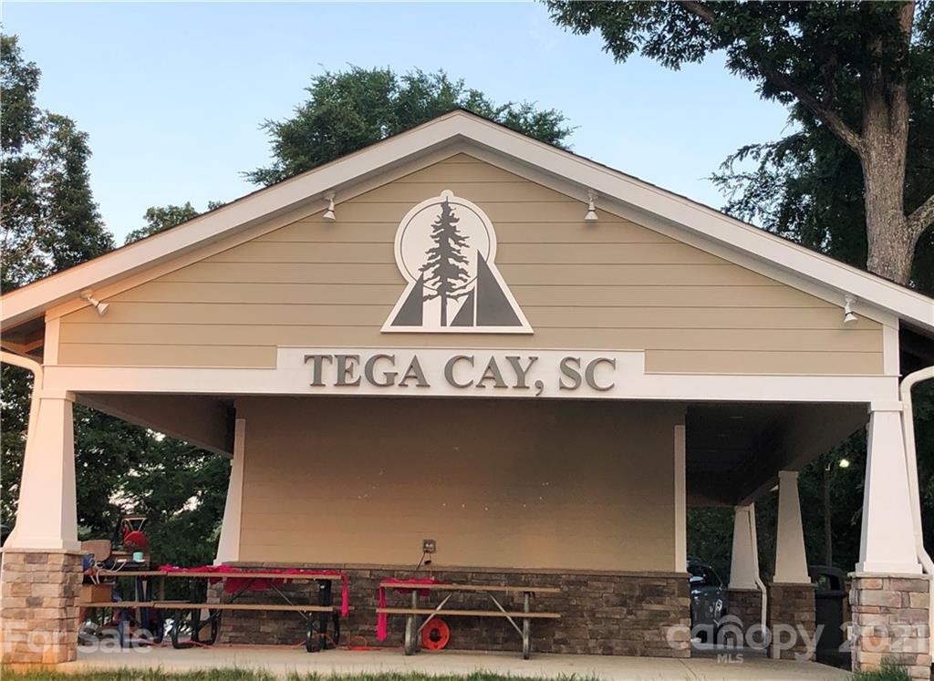 107 Inlet Point Drive Tega Cay, SC 29708 - Photo 22 of 24 a sign on the side of a building