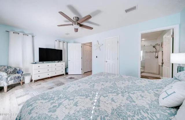 a view of a livingroom with a flat screen tv