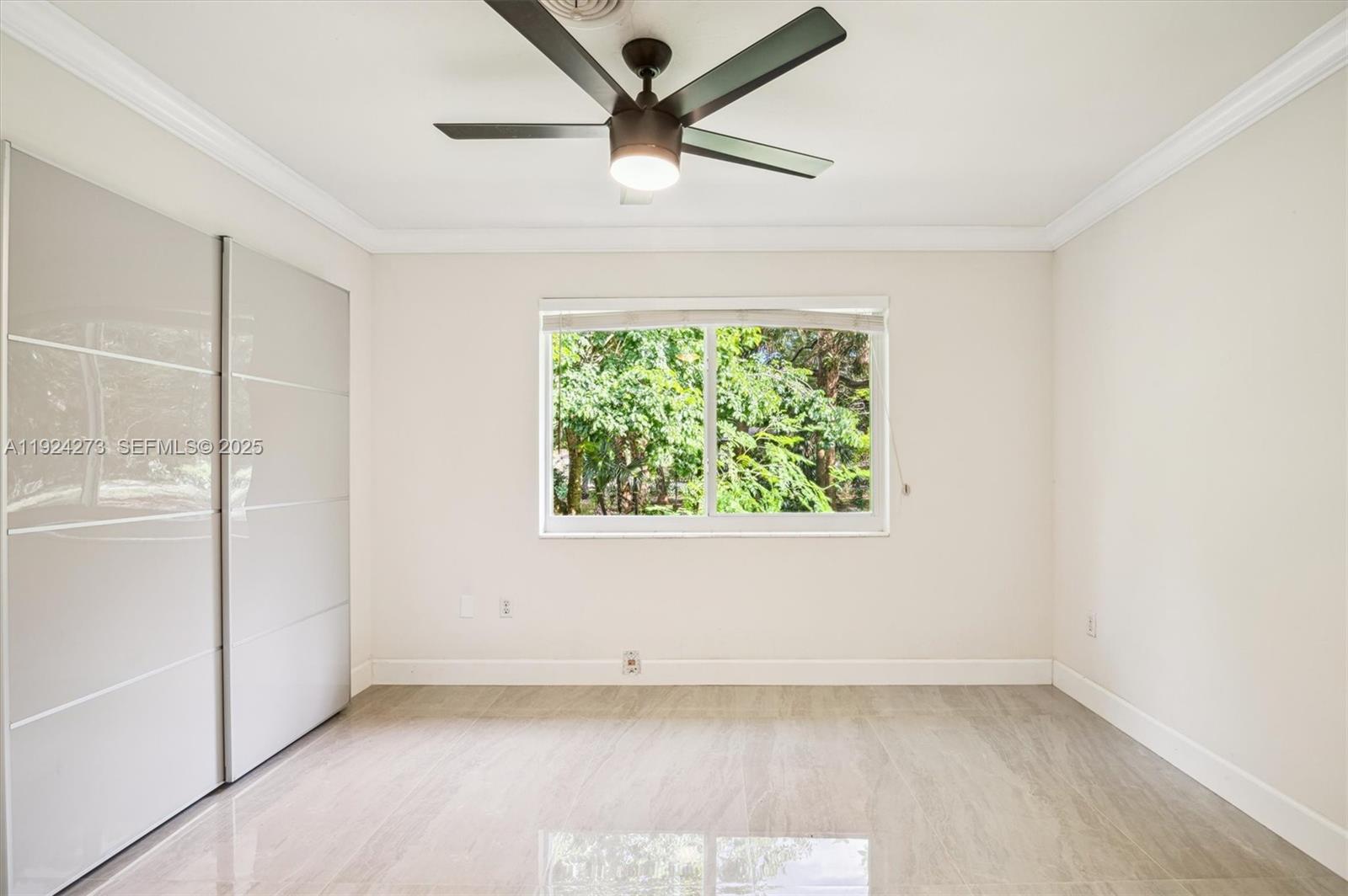 4316 Southwest 6th Street Plantation, FL 33317 - Photo 13 of 24 an empty room with a window