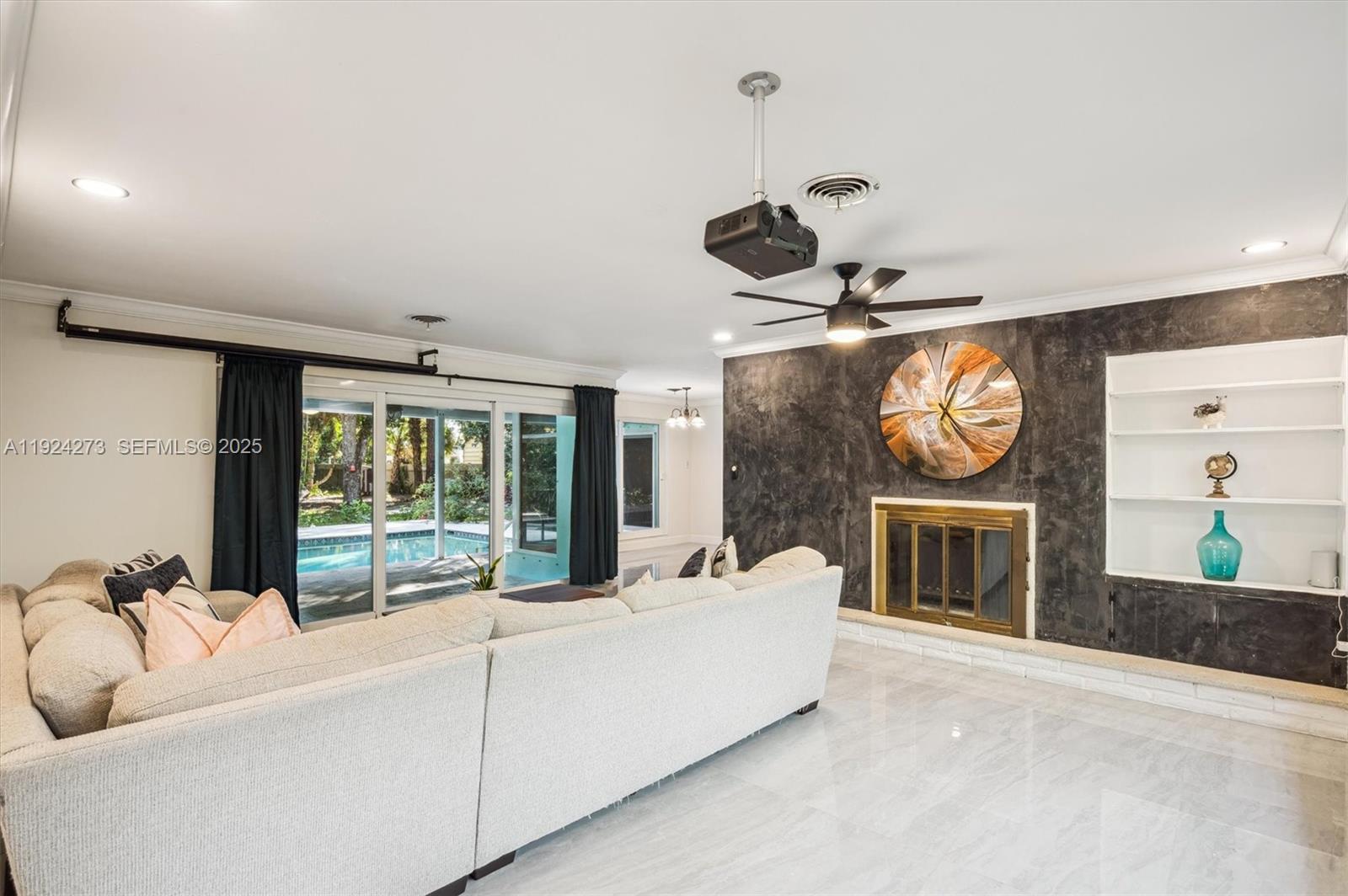 4316 Southwest 6th Street Plantation, FL 33317 - Photo 6 of 24 a living room with furniture and a large window