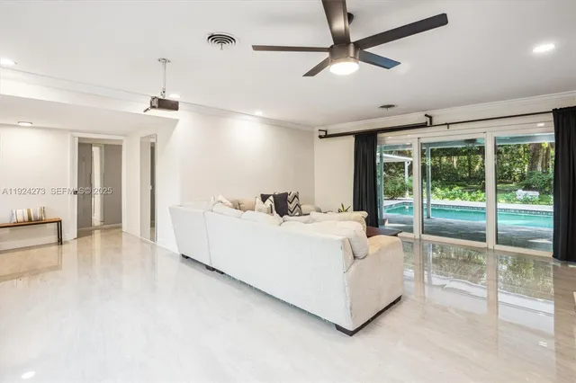 a kitchen with a refrigerator and cabinets
