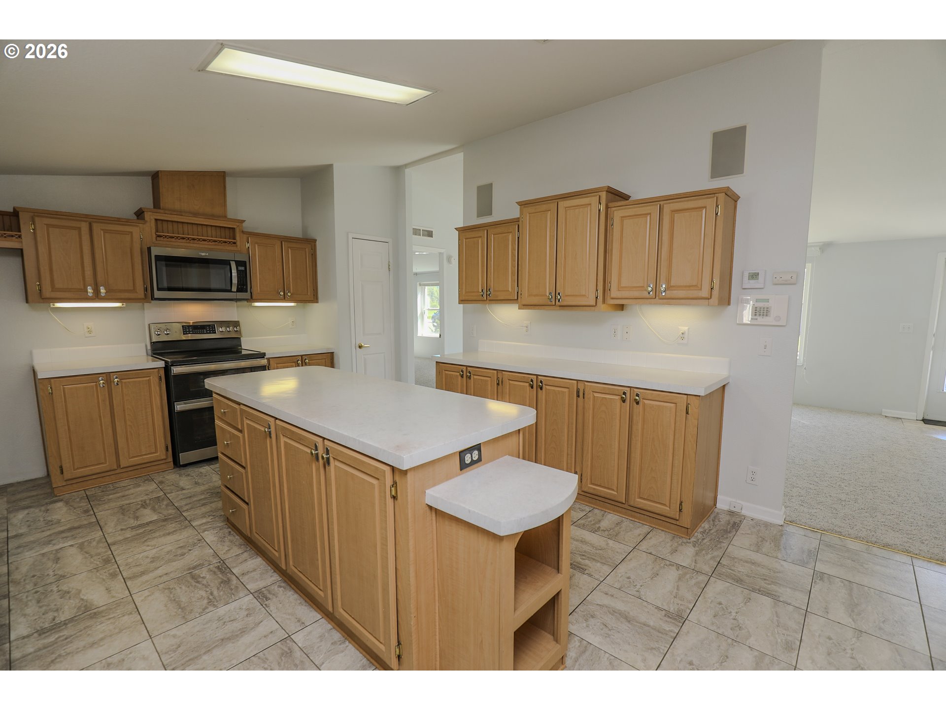 210 Northwest Timothy Avenue Winston, OR 97496 - Photo 13 of 48 a kitchen that has a sink and a stove in it