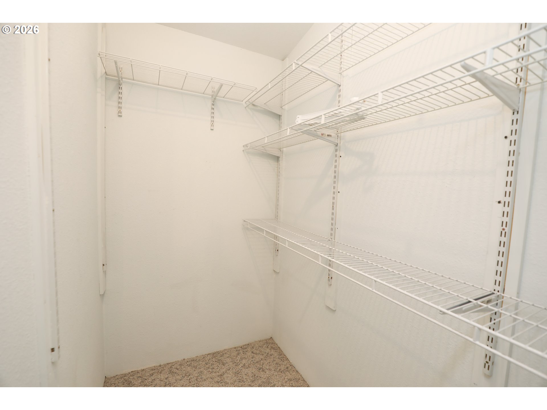210 Northwest Timothy Avenue Winston, OR 97496 - Photo 28 of 48 a view of a room with racks on the wall