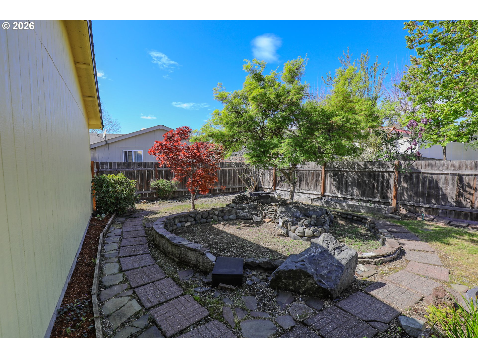 210 Northwest Timothy Avenue Winston, OR 97496 - Photo 33 of 48 a view of a backyard with sitting area