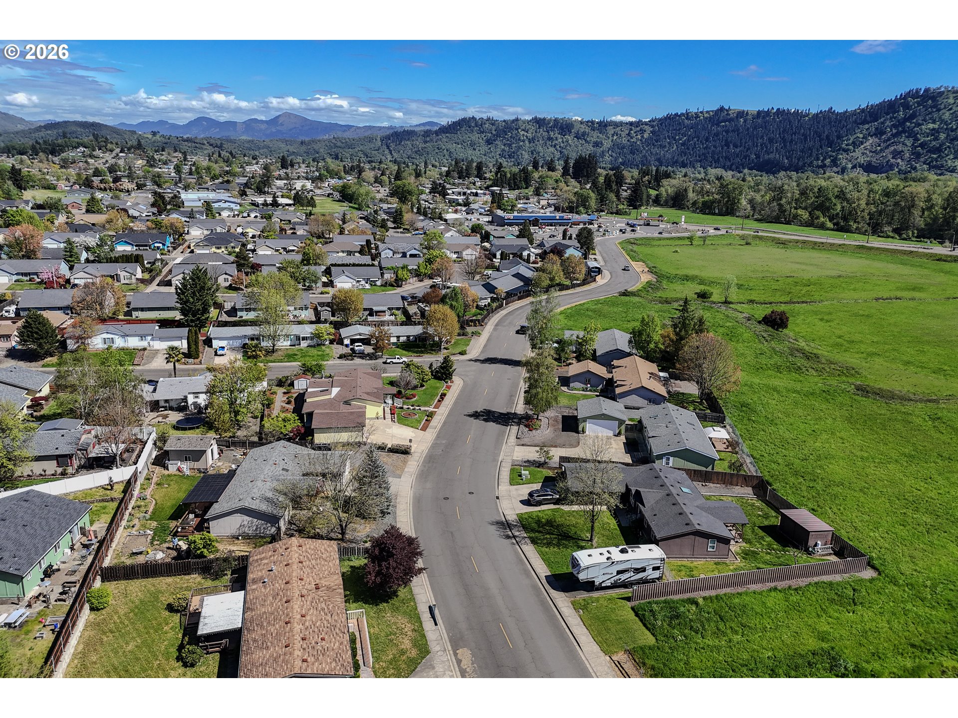 210 Northwest Timothy Avenue Winston, OR 97496 - Photo 45 of 48 an aerial view of residential houses with outdoor space