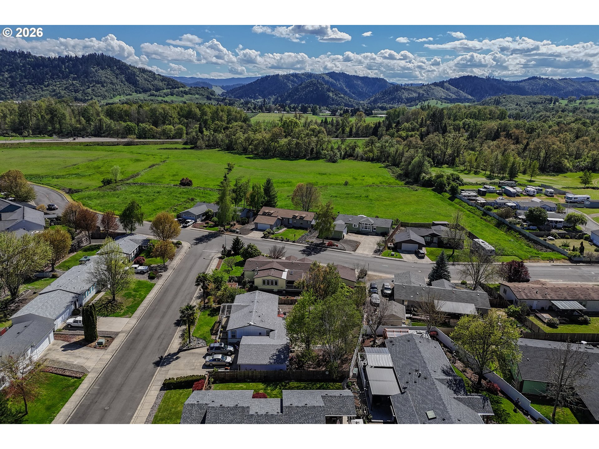 210 Northwest Timothy Avenue Winston, OR 97496 - Photo 47 of 48 a view of a city with a mountain