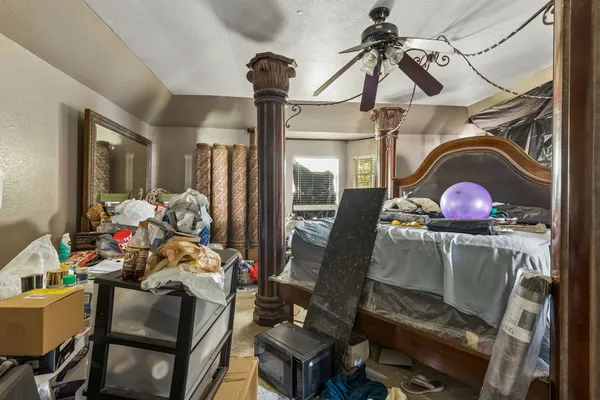 a view of a sink and storage and utility room