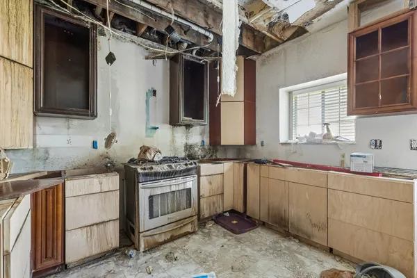 a bathroom with a toilet a sink and a mirror