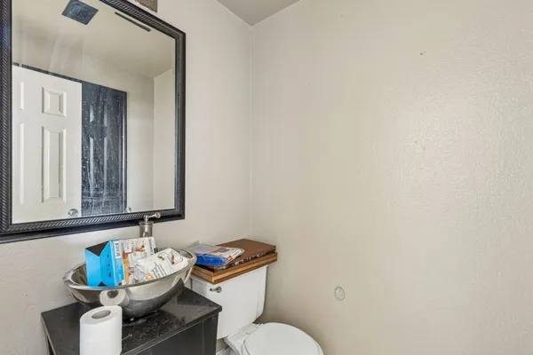 a bathroom with a toilet and a sink