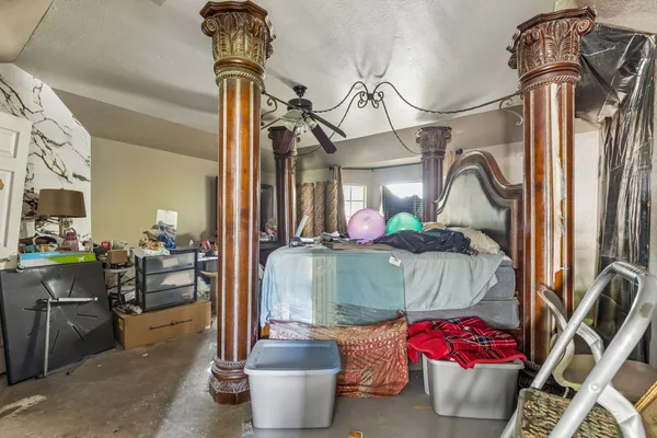 a dining room with furniture and a chandelier