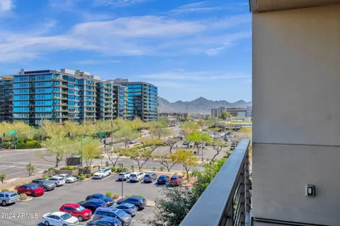 a view of swimming pool with a patio