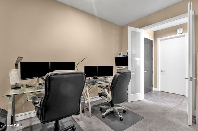 a workspace with furniture and a window