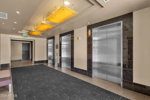 a view of empty room with a bathroom