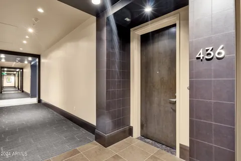 a view of a hallway with elevator