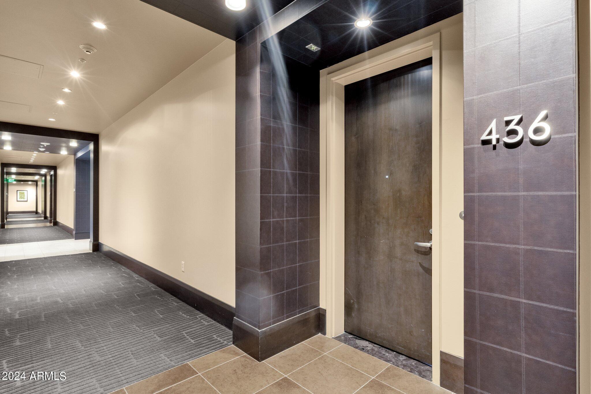 15215 North Kierland Boulevard, Unit 436 Scottsdale, AZ 85254 - Photo 10 of 44 a view of a hallway with elevator