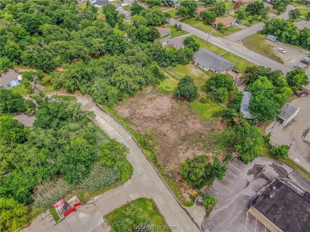 an aerial view of residential house with outdoor space