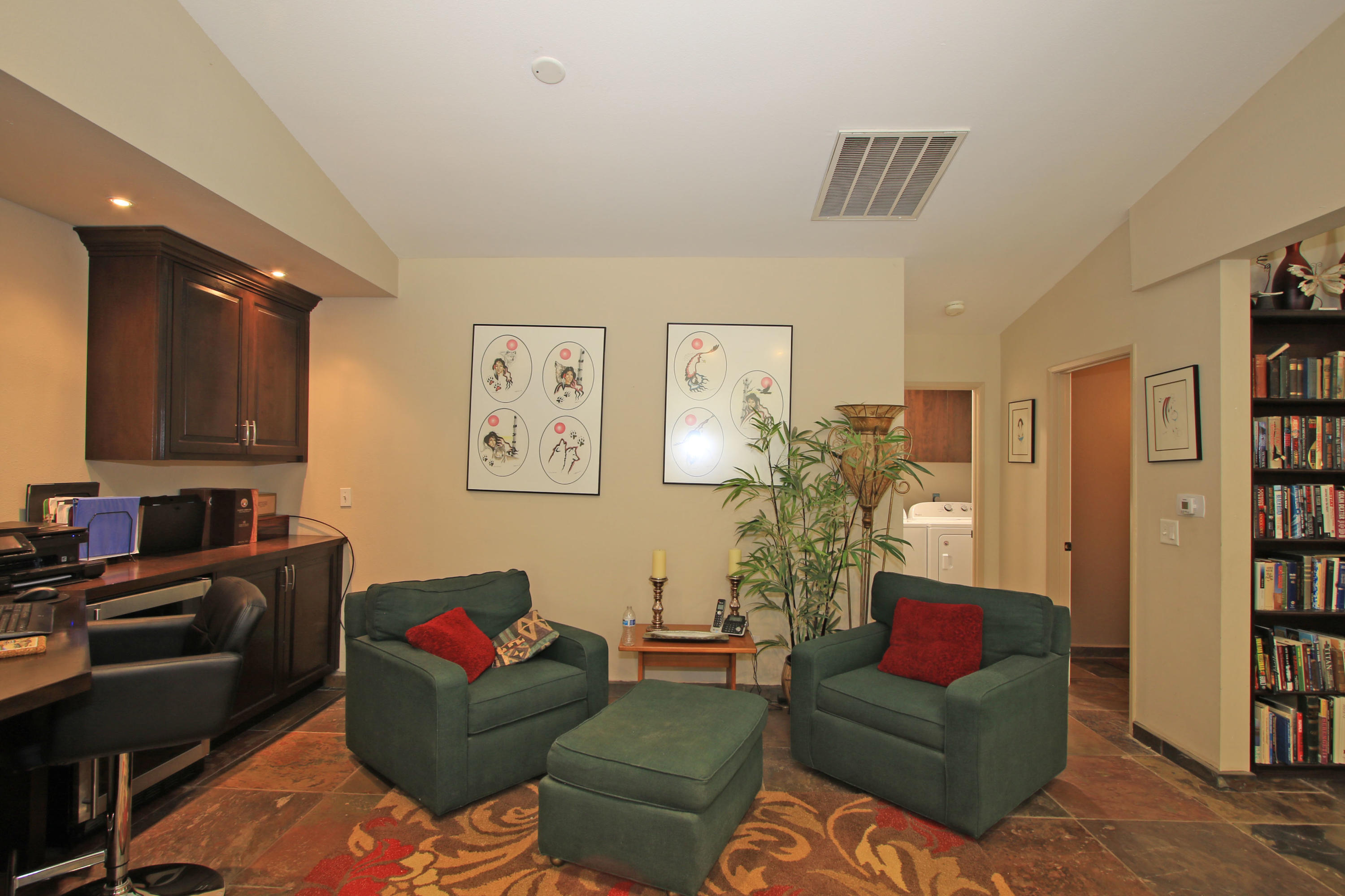 39730 Regency Way Palm Desert, CA 92211 - Photo 17 of 35 a living room with furniture and a couch