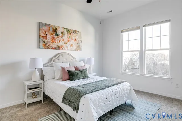 a bedroom with bed and a window