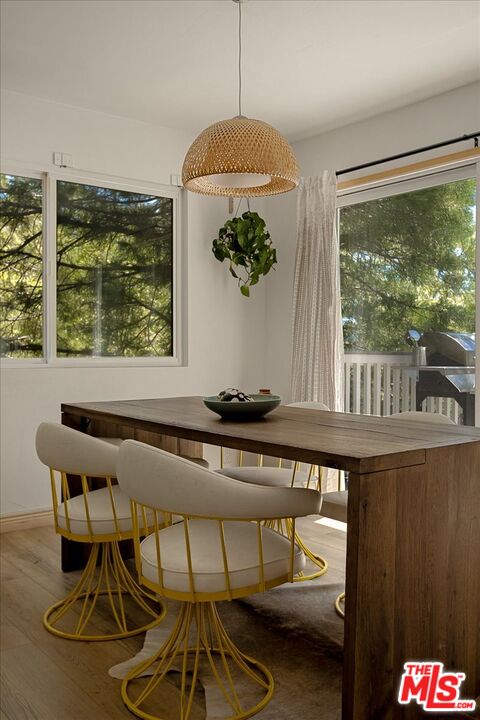 27975 St Bernard Lane Lake Arrowhead, CA 92352 - Photo 12 of 45 a view of a dining room with furniture window and outside view