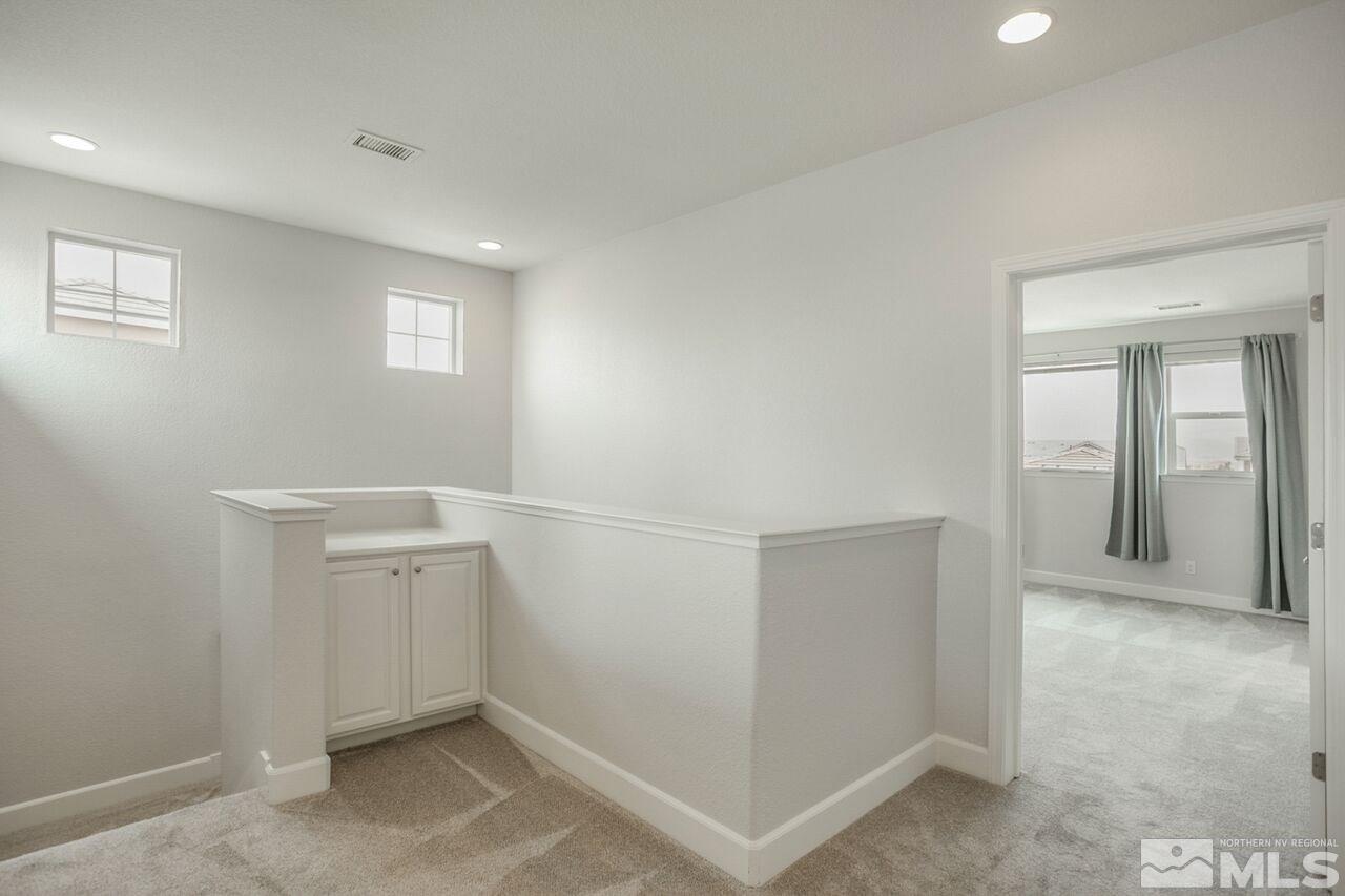 10370 Culiacan Pass Trail Reno, NV 89521 - Photo 15 of 25 an empty room with windows