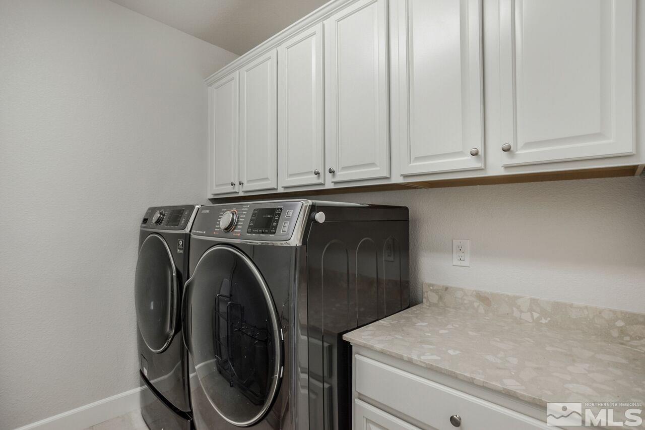 10370 Culiacan Pass Trail Reno, NV 89521 - Photo 22 of 25 a utility room with dryer and washer