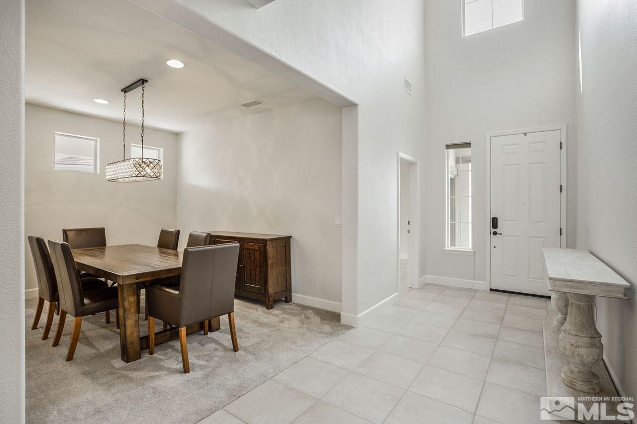 10370 Culiacan Pass Trail Reno, NV 89521 - Photo 4 of 25 a view of a dining room with furniture