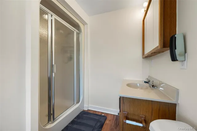 a bathroom with a sink and mirror
