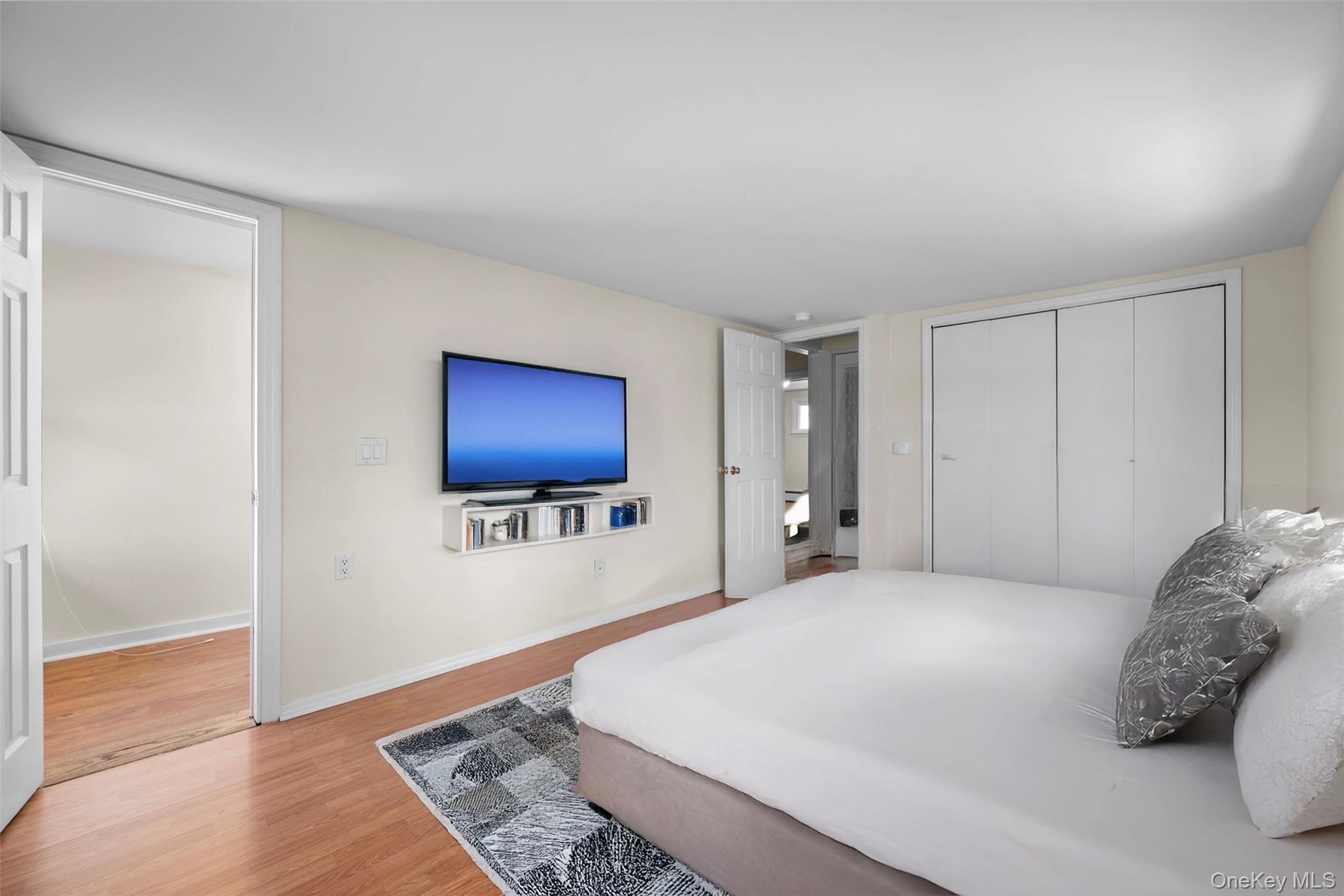 96 Galloway Road Warwick, NY 10990 - Photo 10 of 15 a bedroom with a bed and a flat screen tv