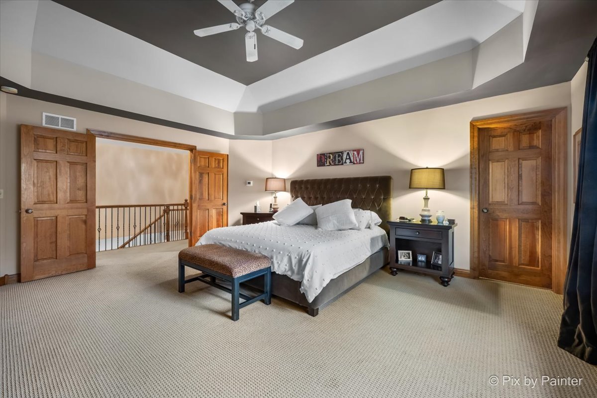 24881 North Black Walnut Cary, IL 60013 - Photo 29 of 53 a spacious bedroom with a bed and large window