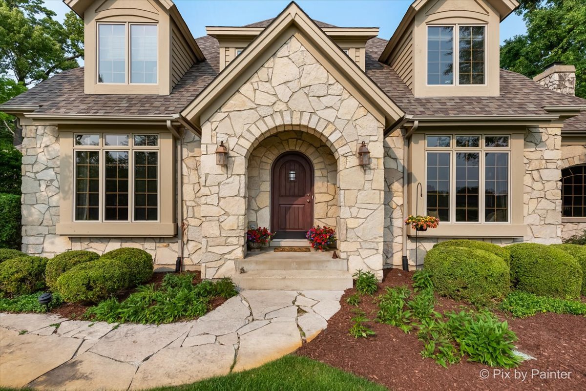24881 North Black Walnut Cary, IL 60013 - Photo 3 of 53 a front view of a house