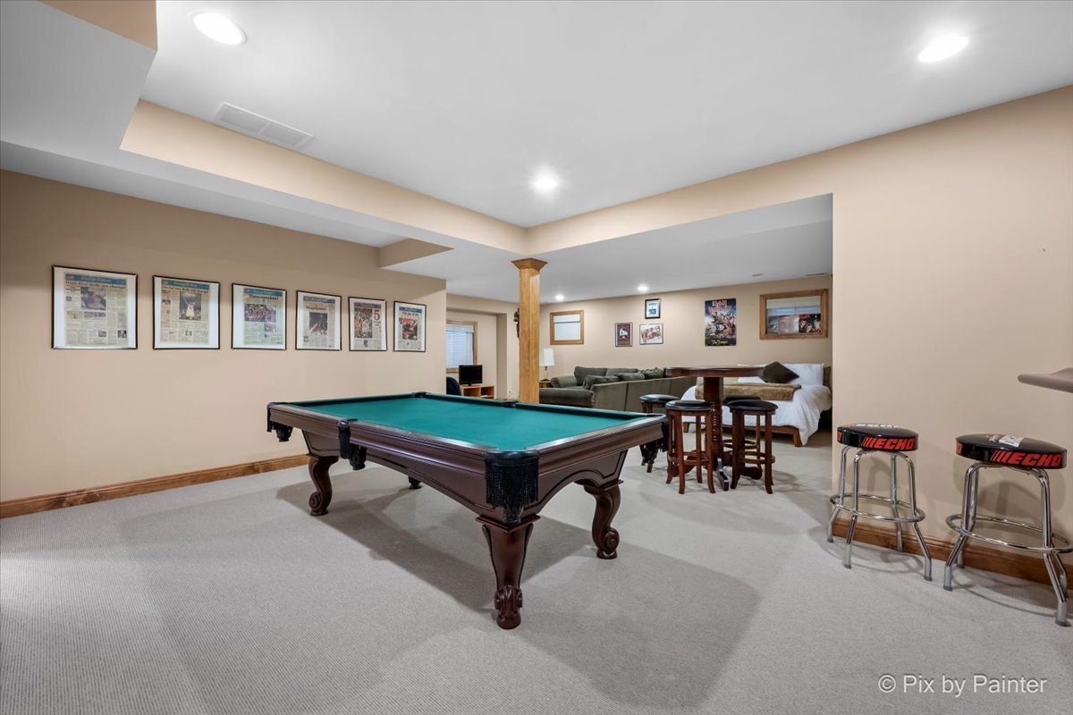 24881 North Black Walnut Cary, IL 60013 - Photo 37 of 53 a room with furniture pool table and windows