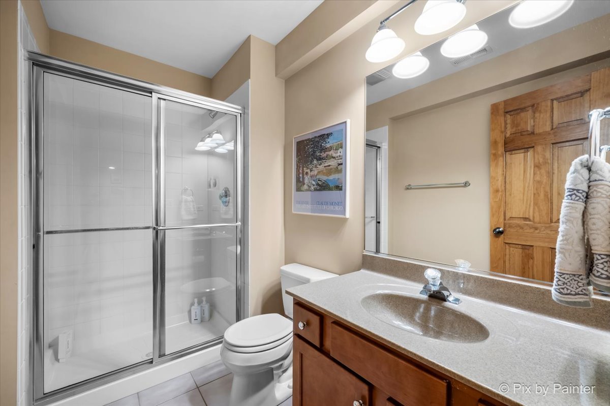 24881 North Black Walnut Cary, IL 60013 - Photo 39 of 53 a bathroom with a sink toilet and shower