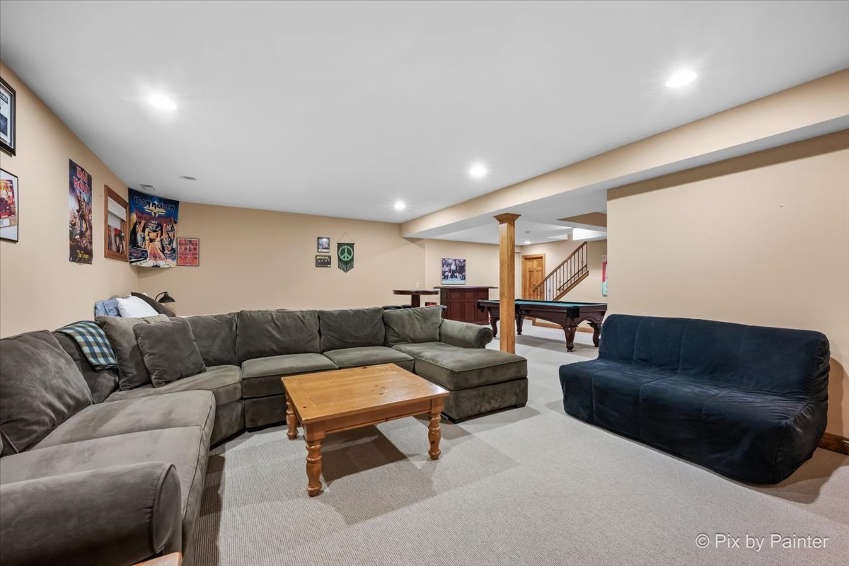 24881 North Black Walnut Cary, IL 60013 - Photo 41 of 53 a living room with furniture and a couch