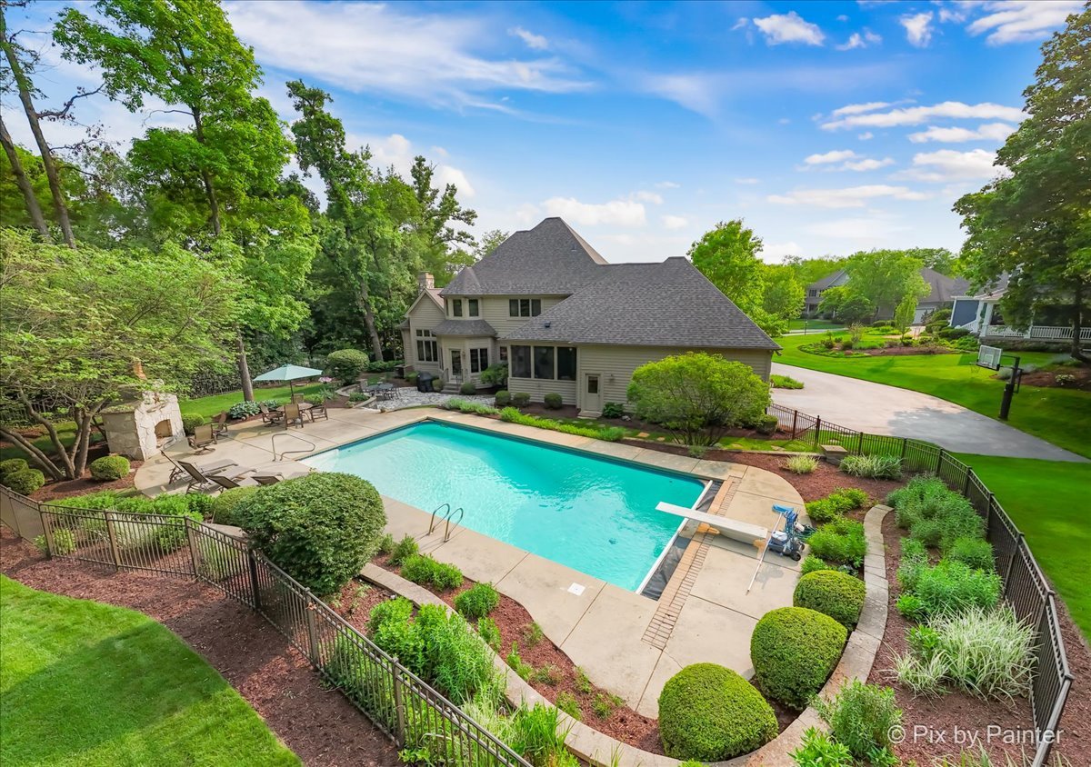 24881 North Black Walnut Cary, IL 60013 - Photo 44 of 53 a swimming pool with outdoor seating and yard