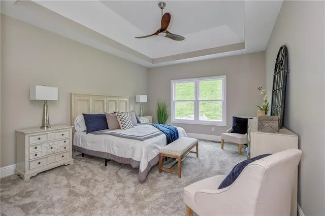 a bedroom with furniture and a window