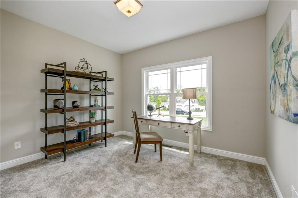 138 Summer Lane McDonald, PA 15057 - Photo 21 of 28 a view of a workspace with furniture and a window