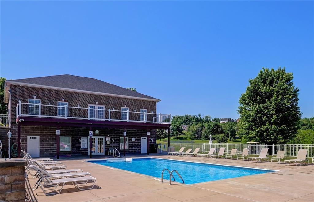 138 Summer Lane McDonald, PA 15057 - Photo 5 of 28 a view of a swimming pool with an outdoor seating