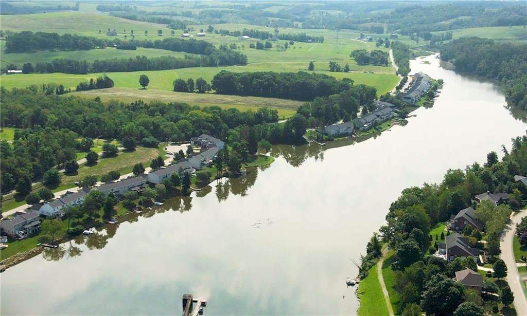138 Summer Lane McDonald, PA 15057 - Photo 7 of 28 a view of a lake with a houses
