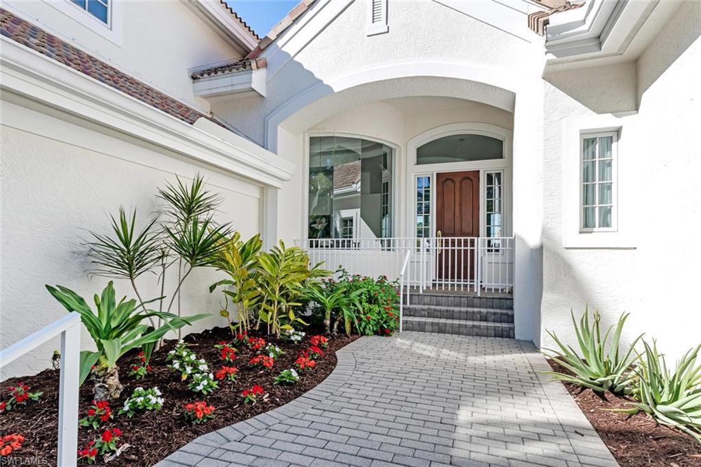 2540 Half Moon Walk Naples, FL 34102 - Photo 3 of 44 a front view of a house