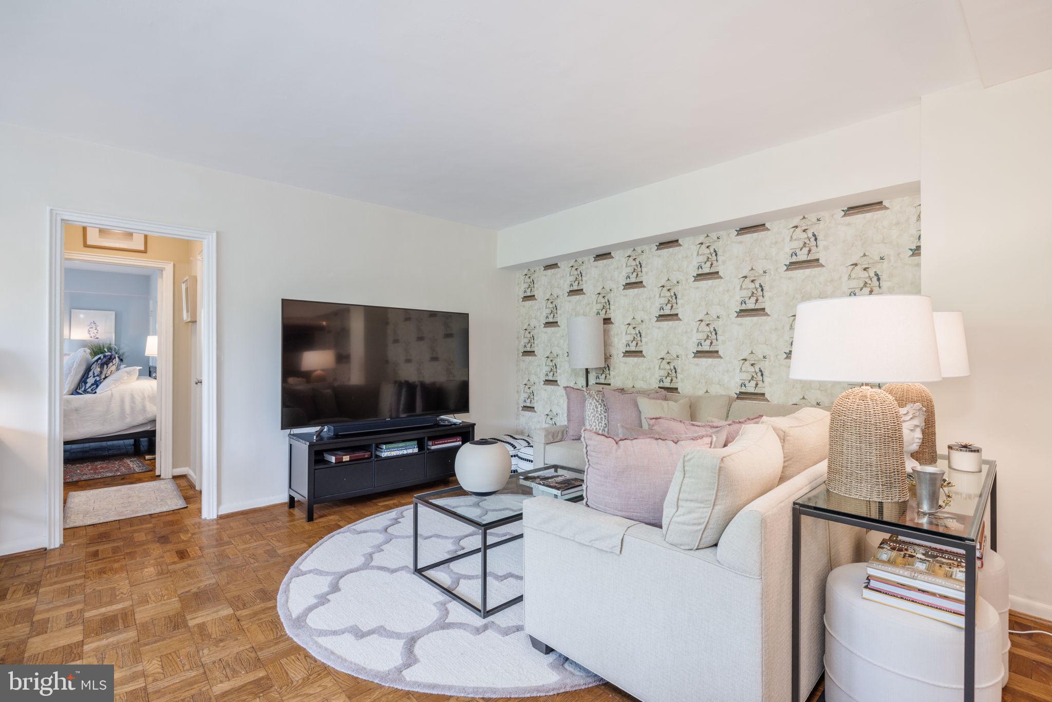 2500 Q Street Northwest, Unit 504 Washington, DC 20007 - Photo 8 of 18 Living area/TV area