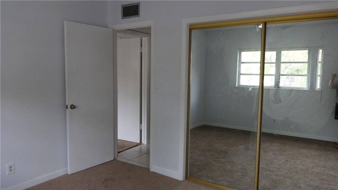 8402 West Sample Road, Unit 141 Coral Springs, FL 33065 - Photo 12 of 18 MASTER BEDROOM