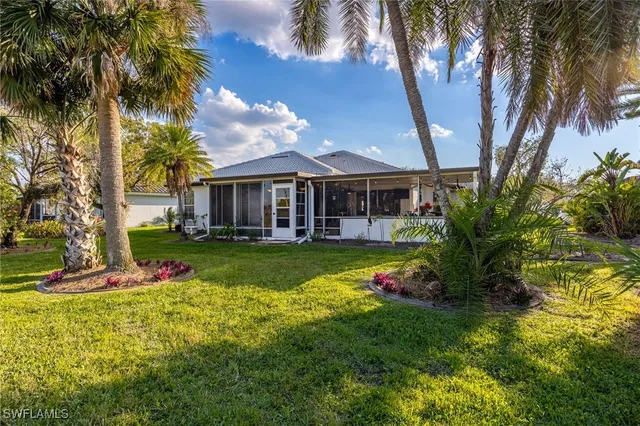 a view of house with a garden