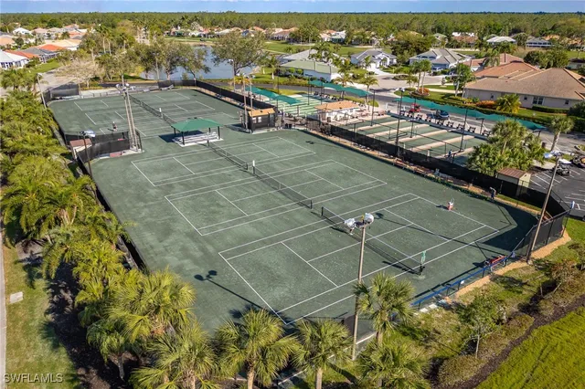 a view of a swimming pool with a lake view