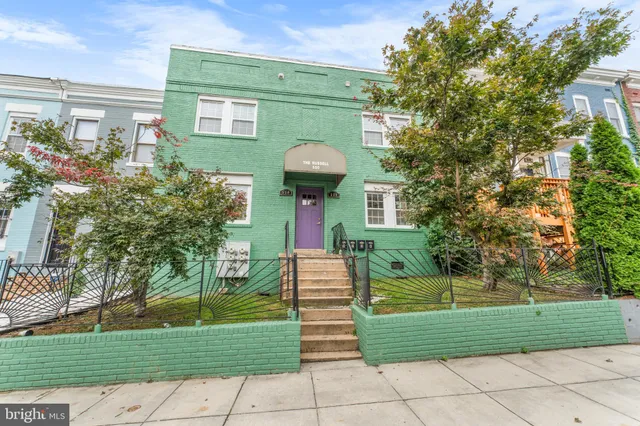 a front view of a house having yard