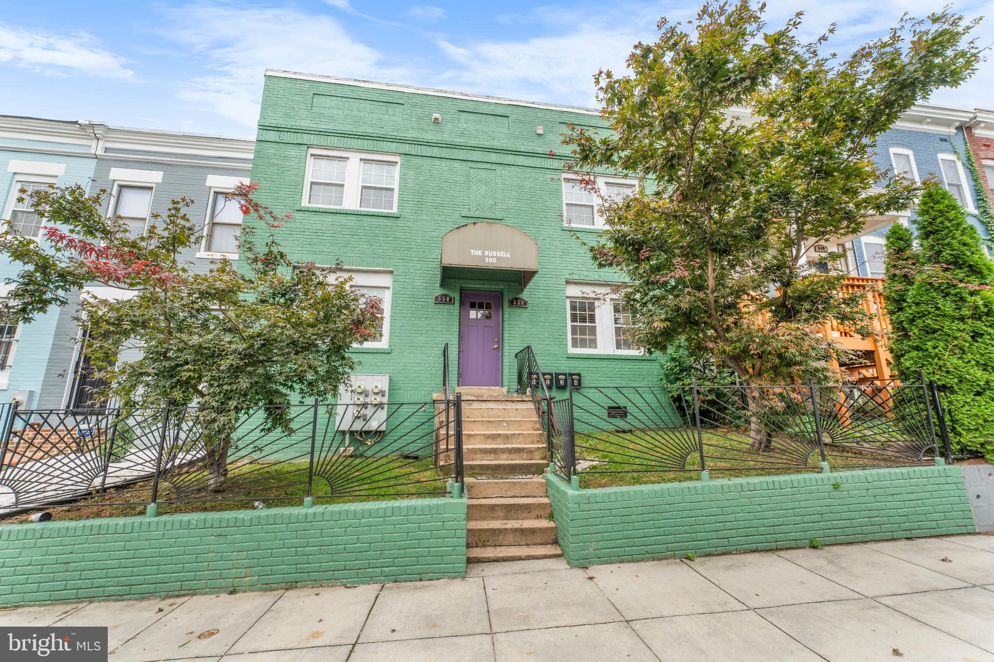 a front view of a house having yard
