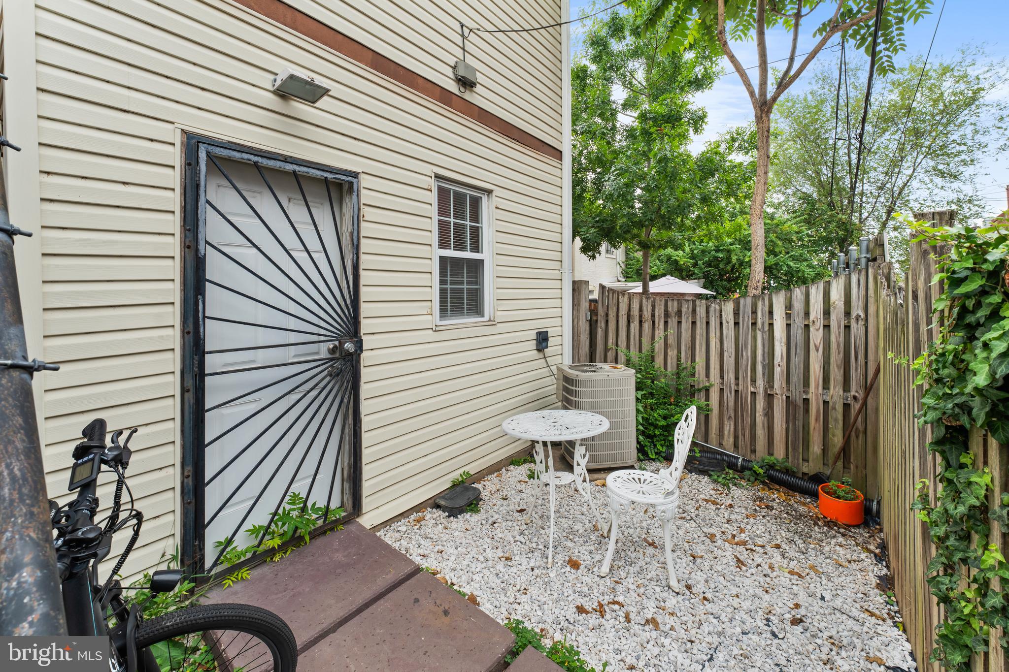 550 Hobart Place Northwest, Unit 1 Washington, DC 20001 - Photo 20 of 22 a view of a chair in backyard of the house