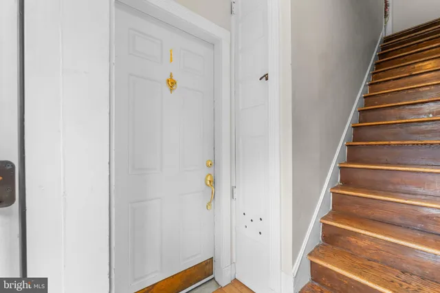 a view of entryway with wooden floor