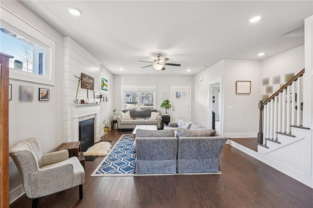 5175 North Pratt Street Covington, GA 30014 - Photo 11 of 52 a living room with furniture and a chandelier