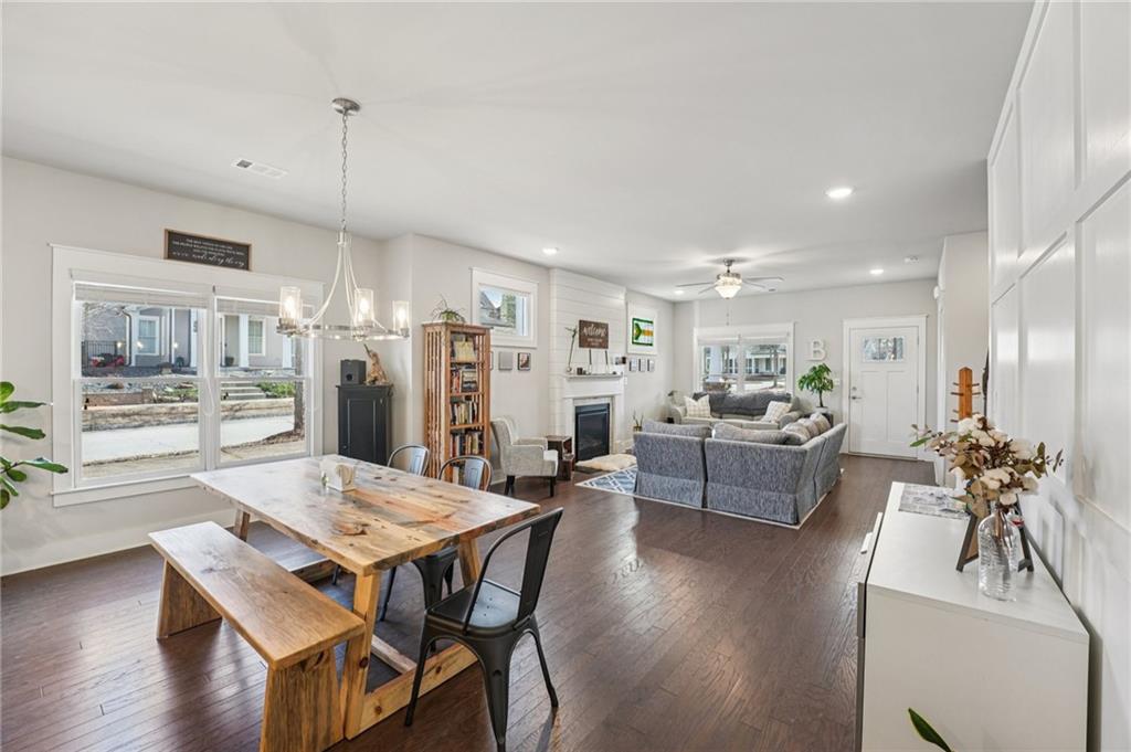 5175 North Pratt Street Covington, GA 30014 - Photo 16 of 52 a living room with lots of furniture and kitchen view